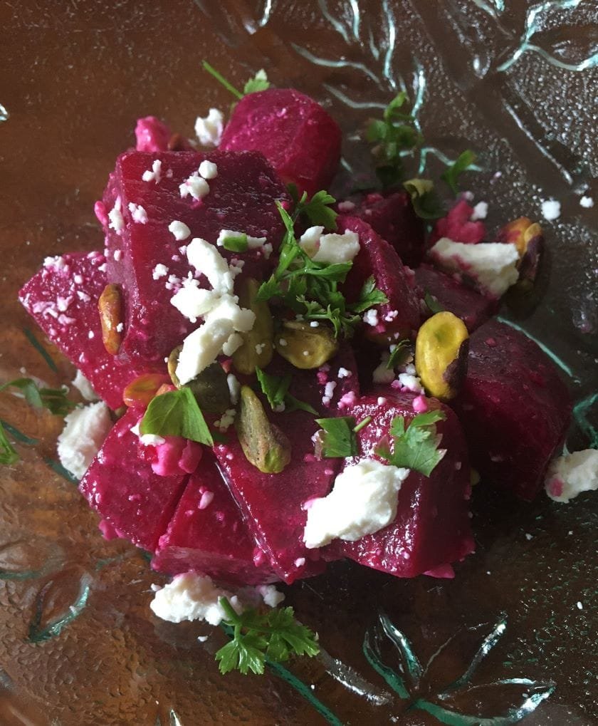 beet salad with blue cheese and pistachios, served cold.
